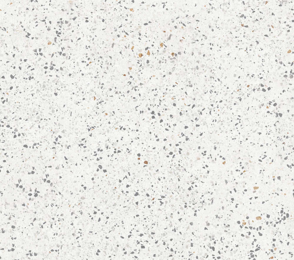 White terrazzo countertop with flecks of black, gray, and gold, paired with white kitchen cabinets for a modern and dynamic look.