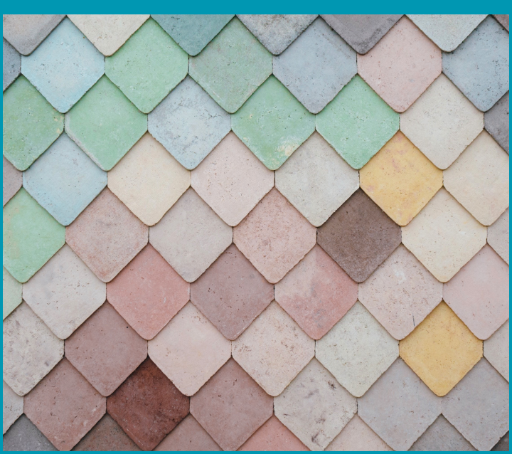 Colorful glass tile backsplash with various pastel shades in a diamond pattern