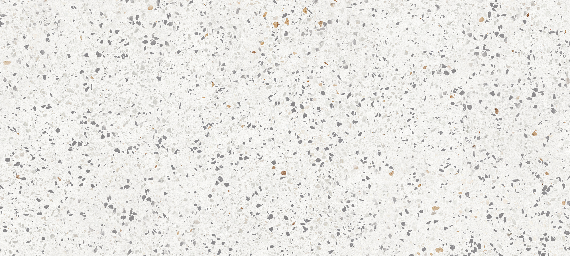 White terrazzo countertop with flecks of black, gray, and gold, paired with white kitchen cabinets for a modern and dynamic look.